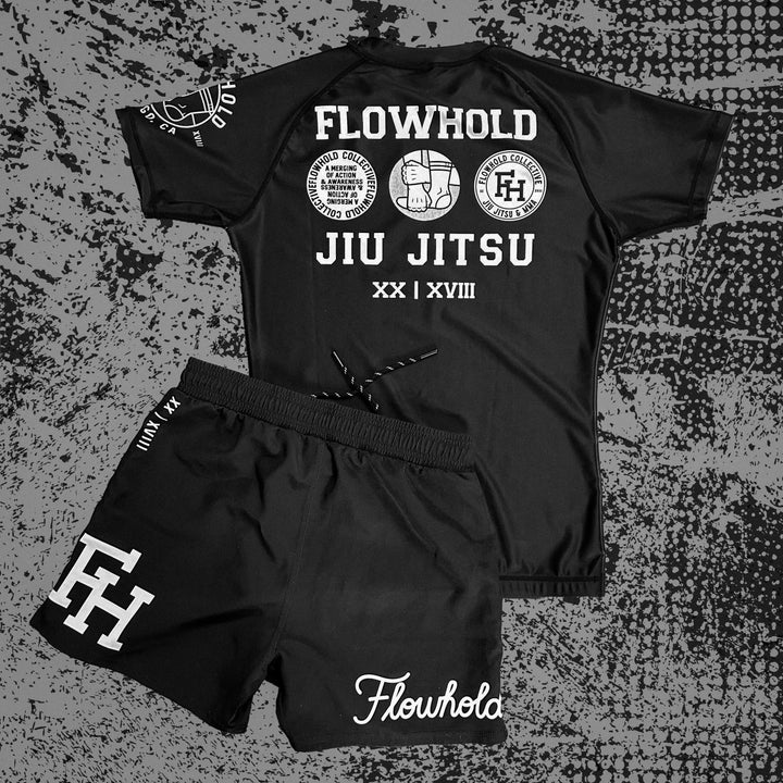The Defeater Rashguard and shorts set by Flowhold – back view flat lay