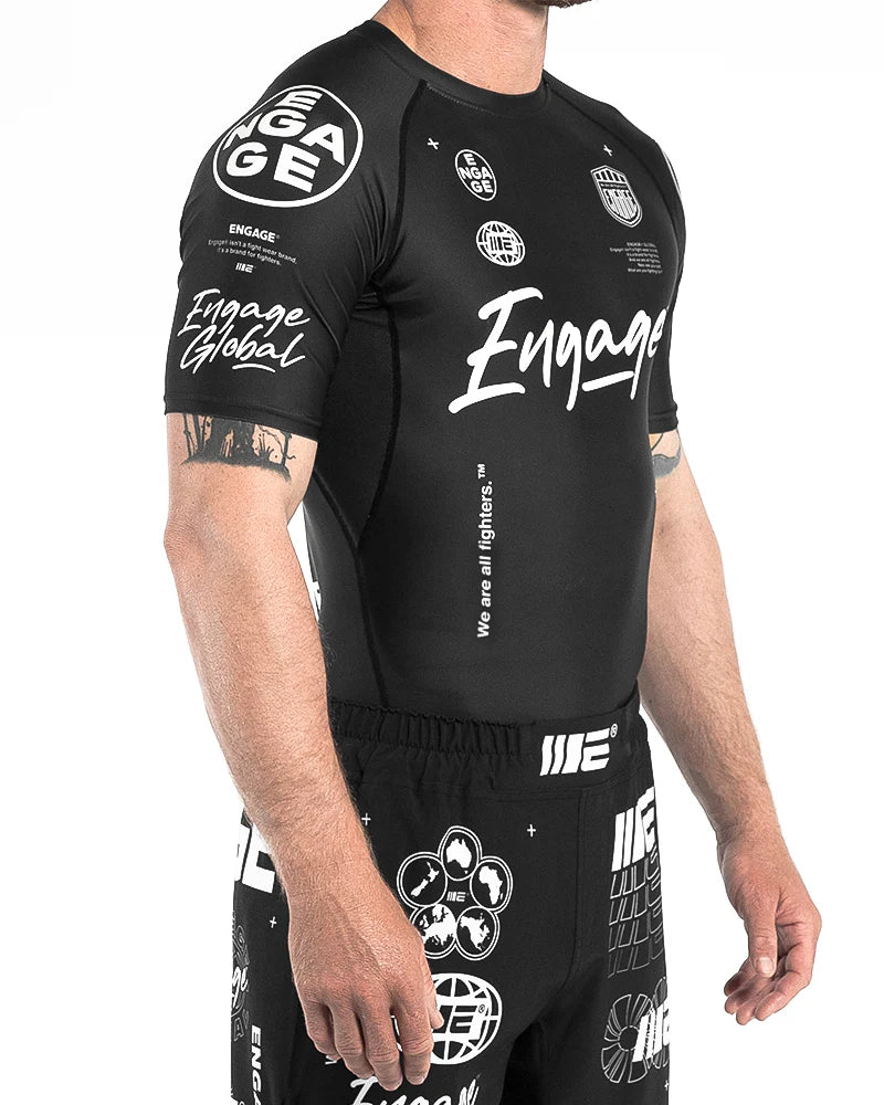 Side front view of Engage Billboard Rash Guard Black on model