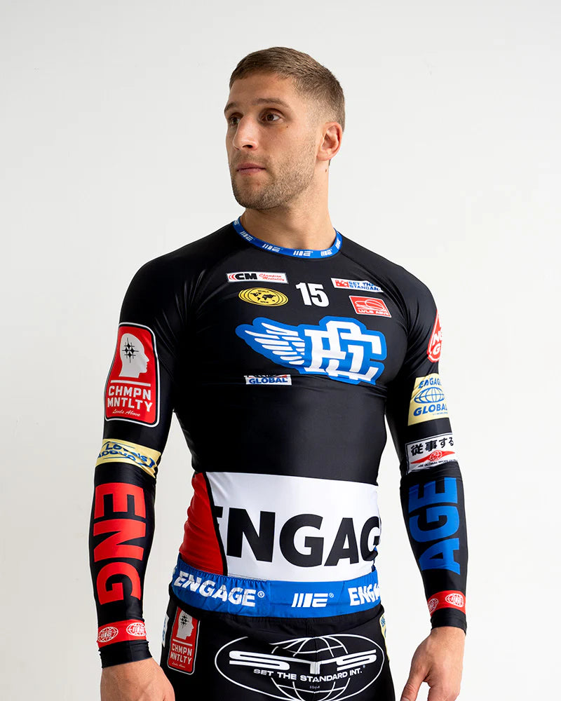 Engage Racer Black Long Sleeve Rash Guard for BJJ and no-gi grappling, front view worn by athlete