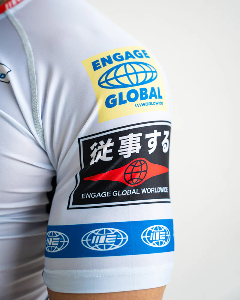 Engage Racer White Rash Guard left shoulder detail with Engage logo, fightwear for Brazilian Jiu Jitsu and MMA