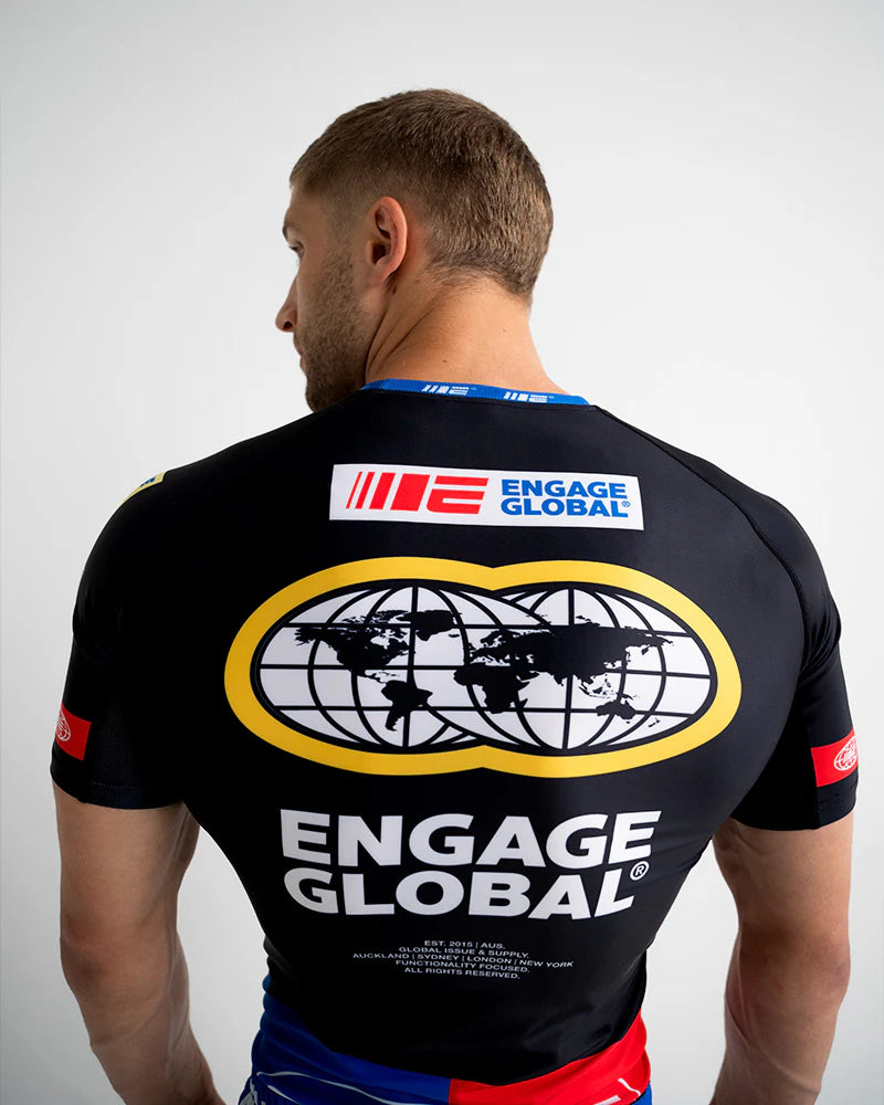 Engage Racer Black Short Sleeve Rash Guard, back view worn for MMA and Brazilian Jiu Jitsu training