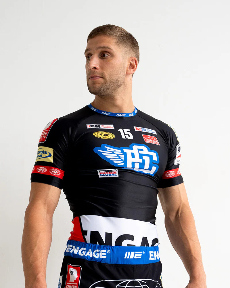 Engage Racer Black Short Sleeve Rash Guard for BJJ and no-gi grappling, front view worn by athlete