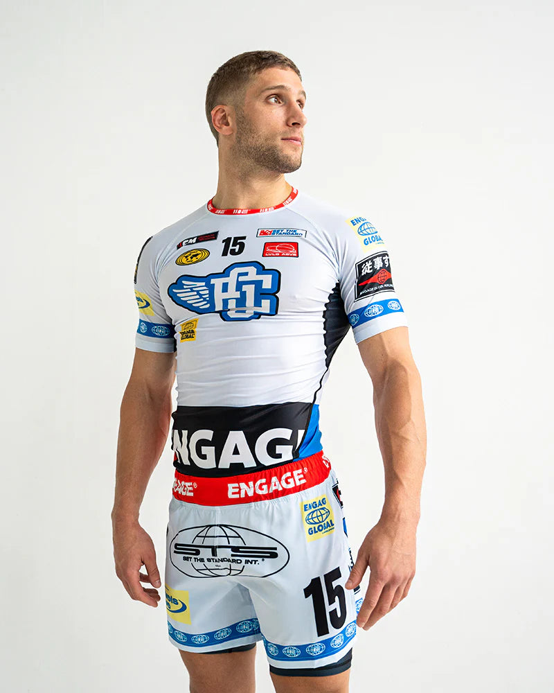 Engage Racer White Short Sleeve Rash Guard for BJJ and no-gi grappling, front view worn by athlete