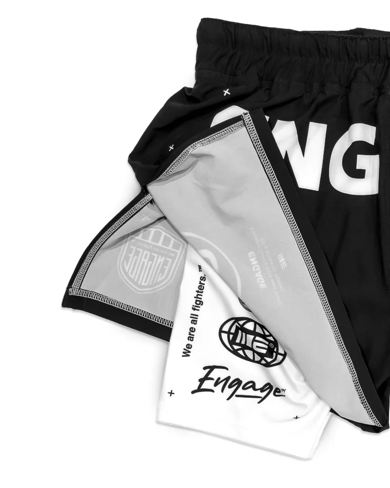 Front view of Engage Billboard 2-in-1 Hybrid Shorts Black with right leg logo detail