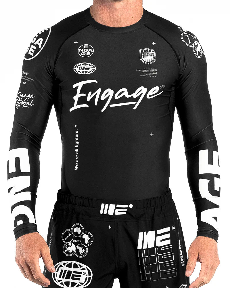 Front view of Engage Billboard Long Sleeve Rash Guard Black worn by model
