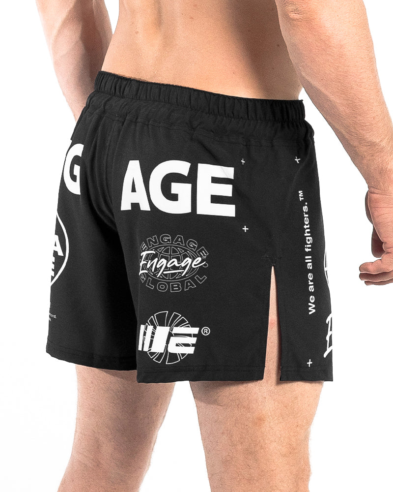Side back view of Engage Billboard MMA Hybrid Shorts Black on model