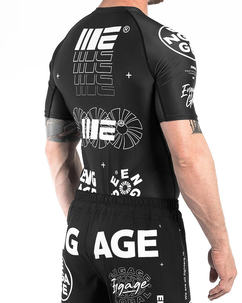 Side back view of Engage Billboard Rash Guard Black on model