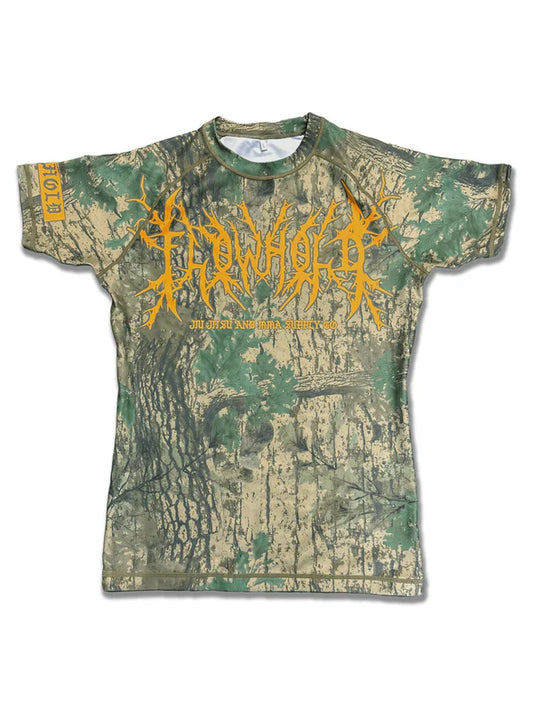 Mossy Choke Rashguard front view – forest camo grappling rashguard with yellow accents