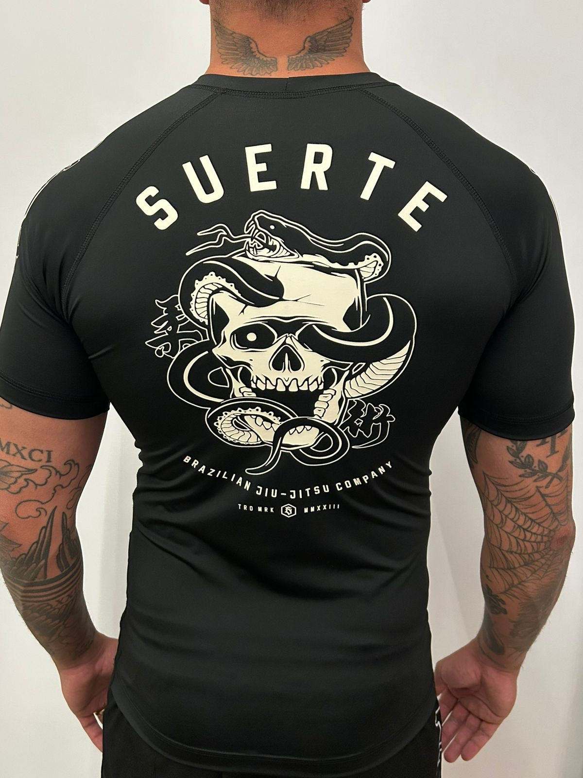 Suerte Snake Rash Guard